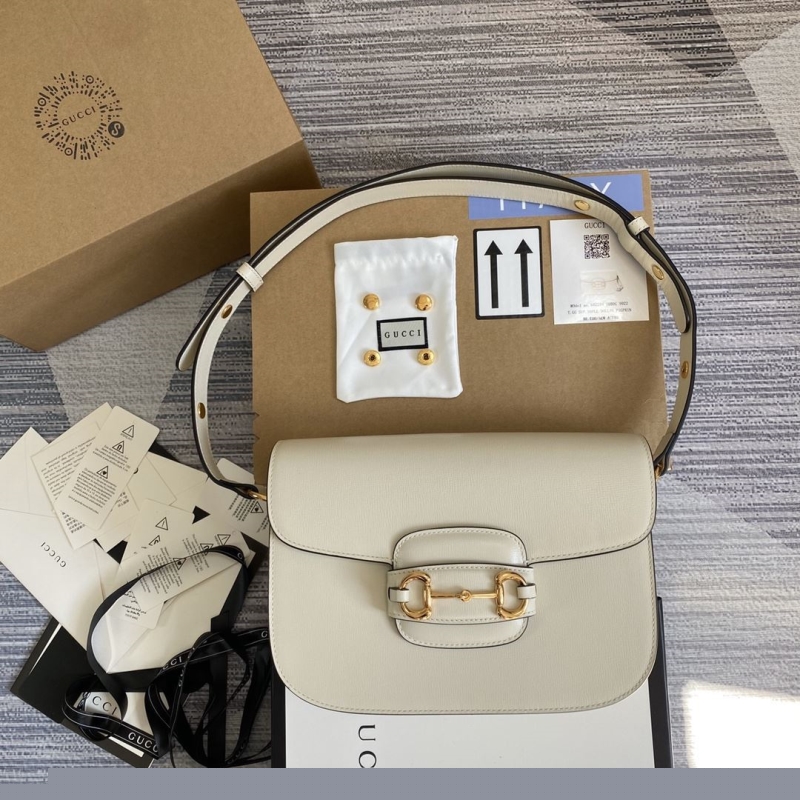 G*u*i top handle bags